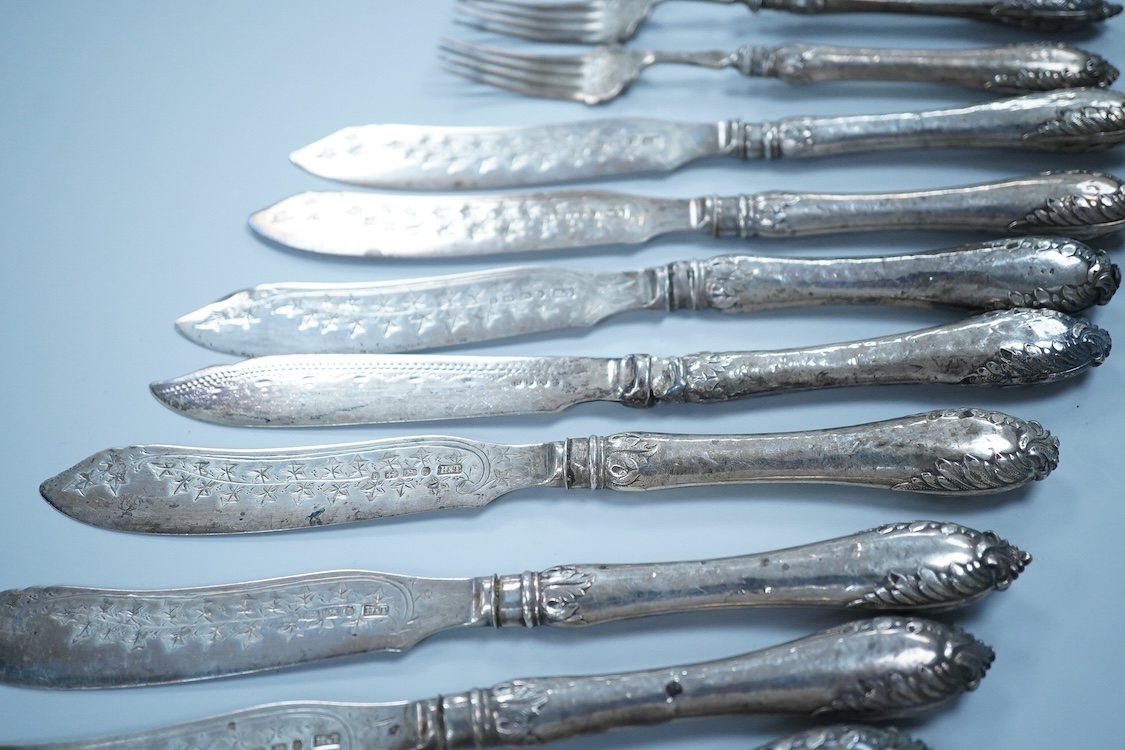 Eight Victorian silver fish forks and seven fish knives, by Hilliard & Thomason, Birmingham, 1878, with loaded unmarked white metal handles, one a plated replacement.